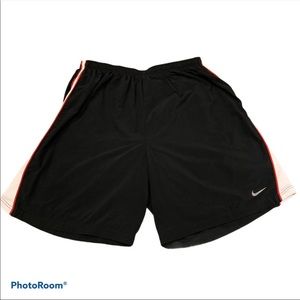 Nike dri fit running shorts with red/white stripe